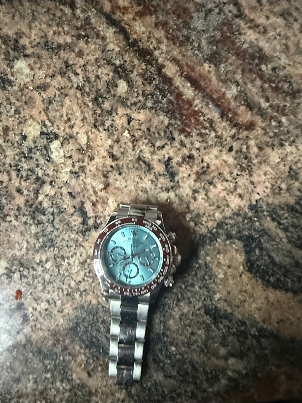 Rolex Silver Stainless Steel Chronograph Watch with Turquoise Dial